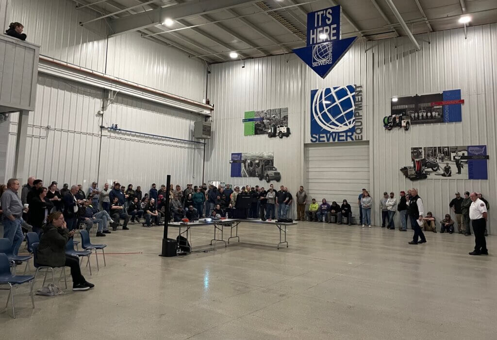 Sewer Equipment's team gathers together with the Dixon Fire Department. 