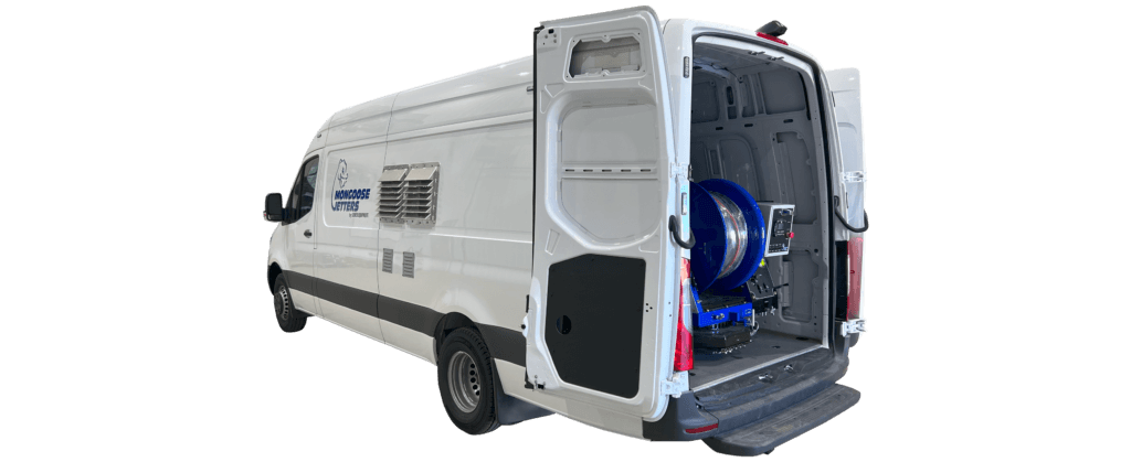 The Mongoose Jetters Model 184 Sewer Jetter Truck, 18 GPM @ 4000 PSI. Back View, doors open.